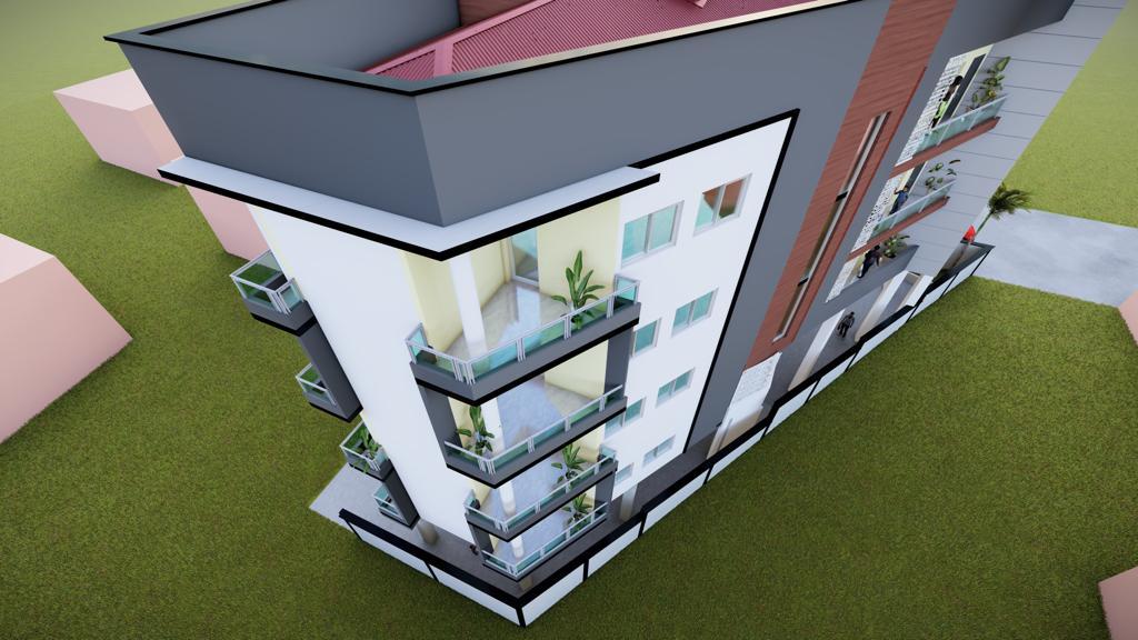 Vue aérienne d'un immeuble collectif avec balcons et toiture terrasse