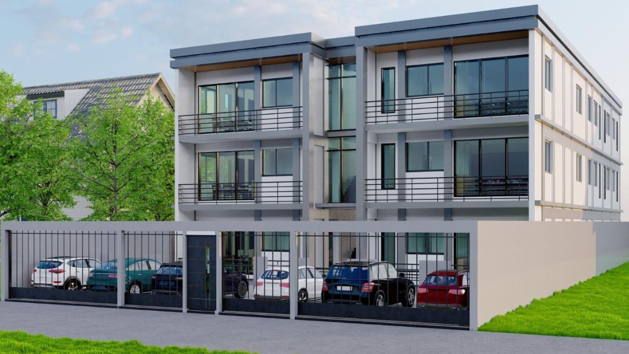 Immeuble collectif avec parking intérieur et clôture